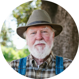 Man with white beard and overalls