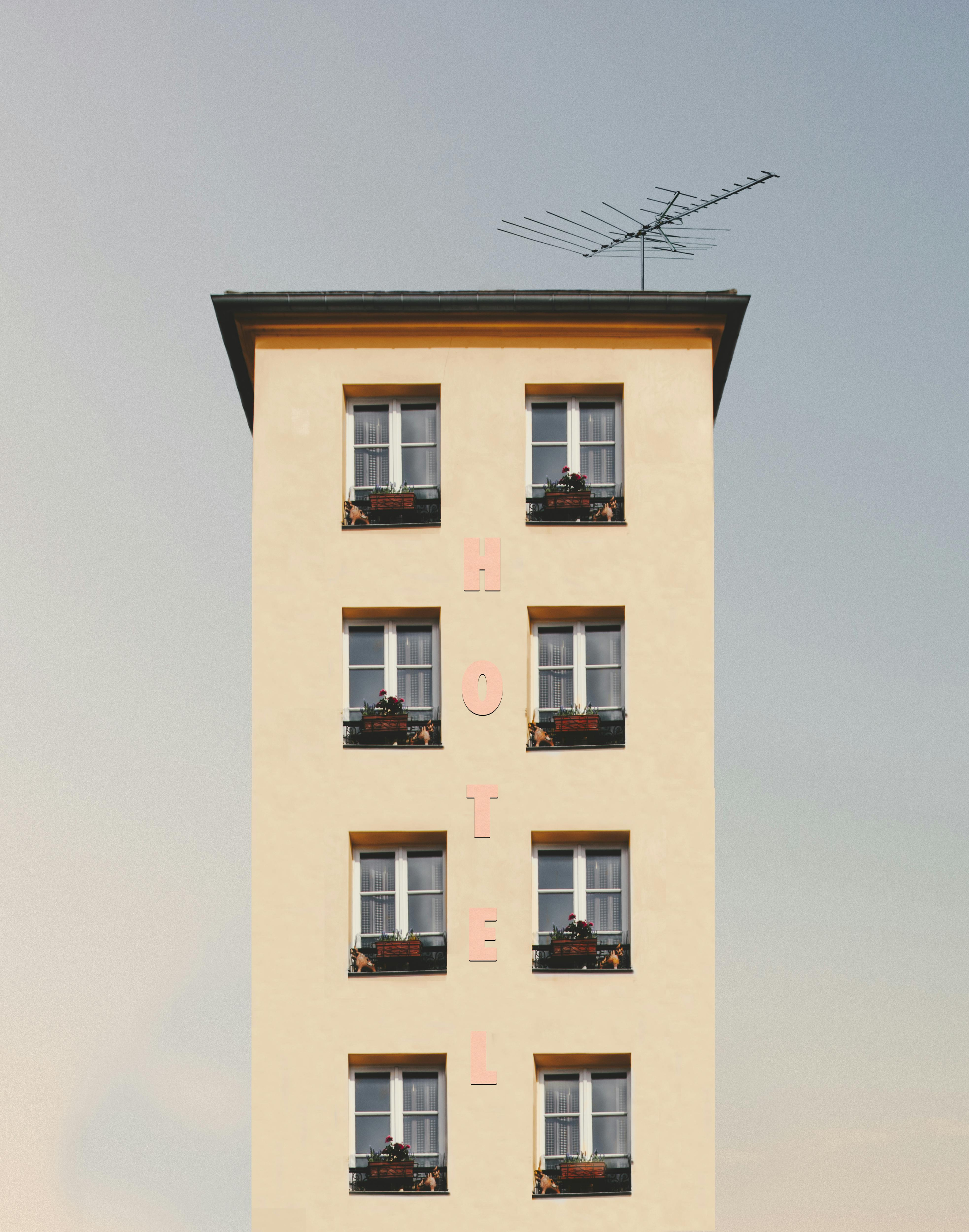 Tall, narrow hotel building.