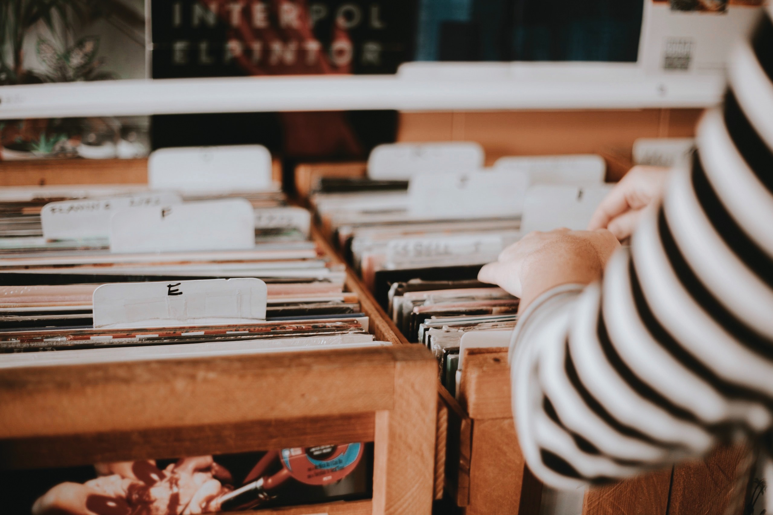 Person looking through old records.